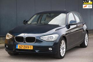 BMW 1-SERIE 114i Upgrade Edition Xenon/Navigatie/Leer/Parkeersensor/Cruise