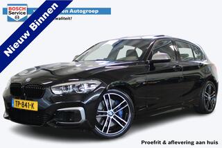 BMW 1-SERIE M140i Edition Shadow High Executive | 340 PK | Harman / Kardon | Apple CarPlay | Schuif / kantel dak | Vol lederen memory sportstoelen met verwarming | Cruise | Clima | Nederlands geleverde BMW | LED kolampen | Lane en bots assist |
