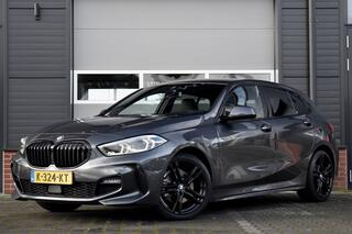 BMW 1-SERIE 118i Aut. High Executive M Sport | NL-Auto | Lederen Bekleding | Stoelverwarming | Apple Carplay/Android Auto | 18'' Velgen |