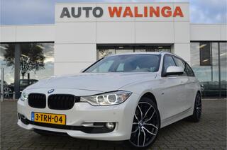 BMW 3-SERIE Touring 330d NL auto | Parelmoer wit | Xenon | Leer | Groot navi | Trekhaak | HUD | 19 inch | a.camera | PDC V+A