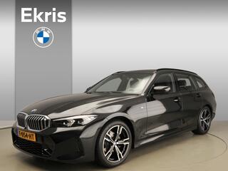 BMW 3-SERIE Touring 318i M-Sportpakket / LED / Leder / Navigatie / Sportstoelen / Trekhaak / Shadow line / DAB / Alu 18 inch