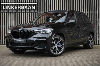 BMW X5 xDrive45e Hybrid | M Sport | Laserlight | Panodak | Trekhaak | H&K | Achterasbesturing | 21 inch |
