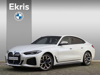 BMW i4 eDrive40 | High Executive / M Sportpakket / Panodak / Head-Up / Harman Kardon / CoPilot Pack / Parking Assistant Plus