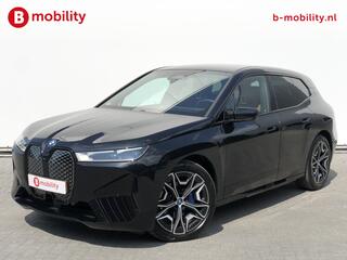 BMW iX xDrive50 High Executive 105 kWh | Trekhaak 2500kg | Sportpakket | Harman/Kardon Sound System | Driving Assistant | Parking Assistan Plus | DAB Radio | Massagestoel