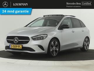 Mercedes-Benz B-KLASSE 180 Luxury Line | Trekhaak  | Panoramadak | Achteruitrijcamera | Sfeerverlichting | Inclusief 24 maanden MB Certified garantie voor Europa.